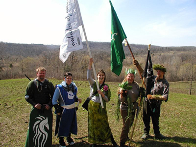 From left to right: Rider of Rohan, Imrahil, Beechbone, Leaflock, and Quickbeam with the flags of Rivendell, Gondor, and the Corsiars of Umbar